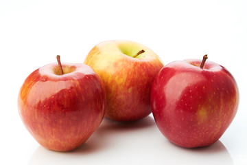 Three red apples