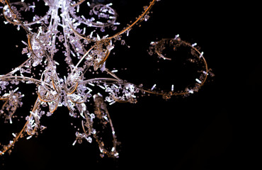 Christmas chandelier. Festive decorations, the chandelier and garland.