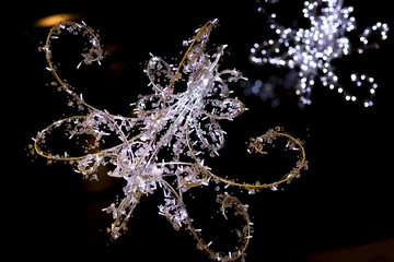 Christmas chandelier. Festive decorations, the chandelier and garland.