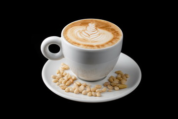 White cup of hot cappuccino on black background