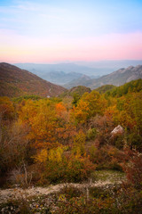 Landscape with the image of mountain sunset