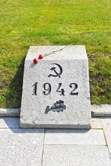 memorial granite tombstone on the common grave at the cemetery P