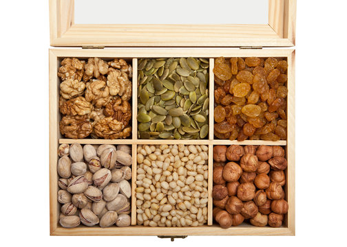 Nuts, Seeds And Raisins In A Wooden Box