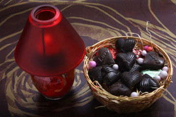 decorated red lamp with metallic bowl, home made chocolates conc