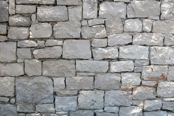 Traditional stone wall texture. In Dalmatia, Croatia. 