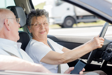 elderly woman driving