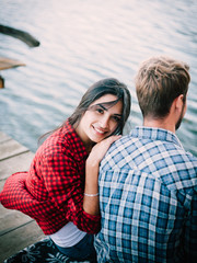 Obraz premium Beautiful girlfriend on boyfriends back