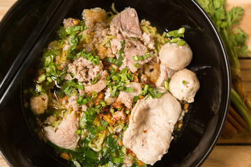 Delicious rice noodles with shrimp close-up on a plate. horizont