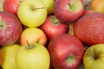 close-up of red and yellow apples