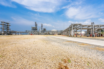 Fototapeta premium oil refinery plant in blue sky