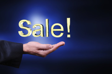 Currency gold symbols in a man hand