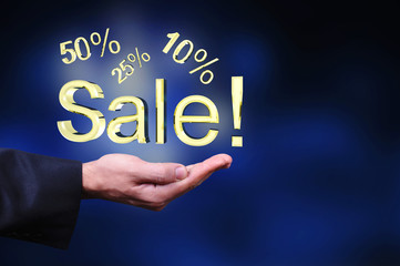 Currency gold symbols in a man hand