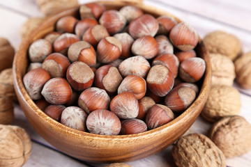 Mix nuts in a wooden bowl