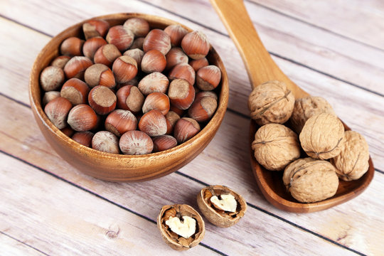 Mix nuts in a wooden bowl