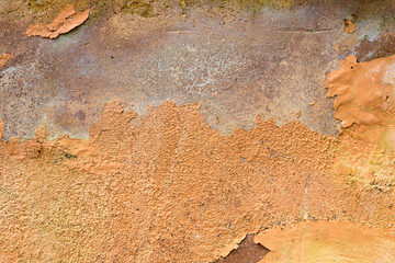 Damaged color on cement wall peeling off