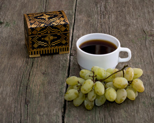 casket, coffee and cluster of grapes