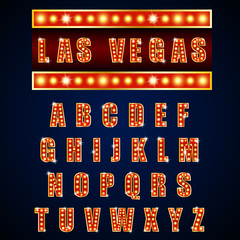 Alphabets lamp of light neon of gold  on blue background 