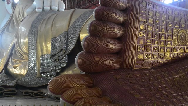 Chauk htat gyi reclining buddha (sweet eye buddha) in yangon, myanmar