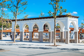 Obraz premium Outer yard of ancient mosque where the tourists have rest ,the mosque located over a hill and built in the time of ottomans in Ankara city in Turkey