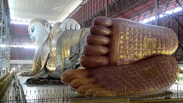 Chauk htat gyi reclining buddha (sweet eye buddha) in yangon, myanmar
