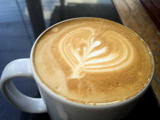 Full Cup of Coffee on the Table