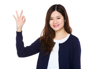 Woman showing ok sign gesture