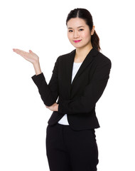 Asian Businesswoman with hand showing blank sign