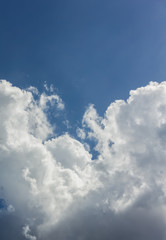 Beautiful light blue sky with puffy white clouds in happy morning day with fresh holiday and freedom feeling 