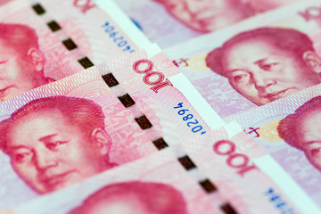 Three new 100 yuan banknotes issued in China on Nov 12 2015 on the left, and three old 100 yuan...