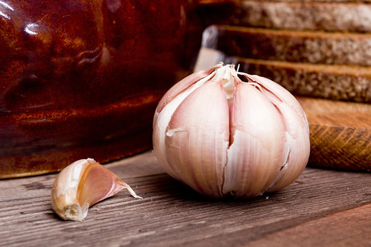 Head of garlic and a separate slice