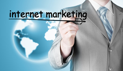 business man writing internet marketing