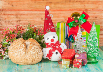 Cheerful Christmas snowman on  background.