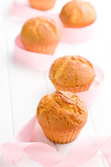 sweet muffins on kitchen table