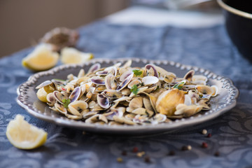 Stir fried clams with roasted paste,garlic, lemon, cilantro