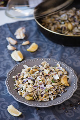 Stir fried clams with roasted paste,garlic, lemon, cilantro