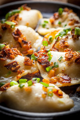 Dumplings with meat, onion and bacon.