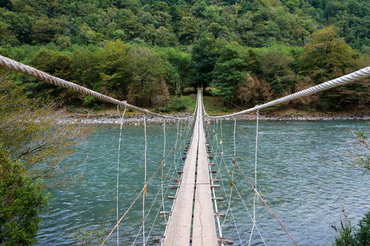 Suspension bridge across the river Bzipi, Abkhazia.