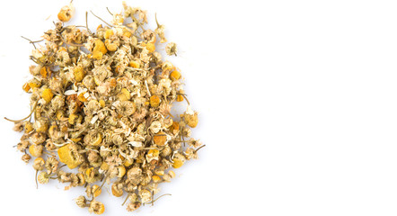 Dried chamomile herbal tea over white background