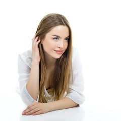 Fototapeta premium Young beautiful tender woman posing against white background. St