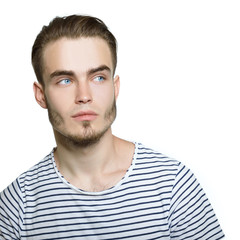 Portrait of attractive young man over white background.