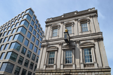 Fototapeta na wymiar Contrast between modern and old building in London