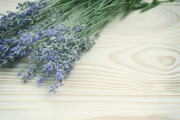 Obraz na płótnie Canvas lavender fresh bunch on aged wooden background