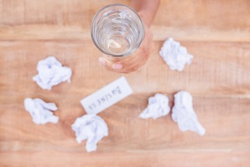 Businesswoman holding a glass of water 