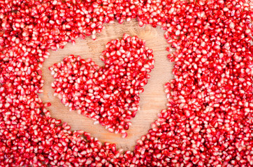 Background of pomegranate seeds. Fresh fruit set.