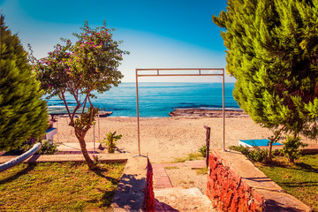 Stony beach and beautifull view to ancient fortress on the Alany