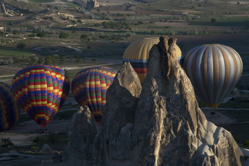 Balloons in flight over Cappadocia. Anatolian plateau. Turkey. Goreme.