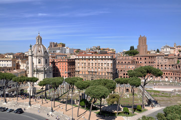 Obraz premium The part of old town and Roman ruins in Rome