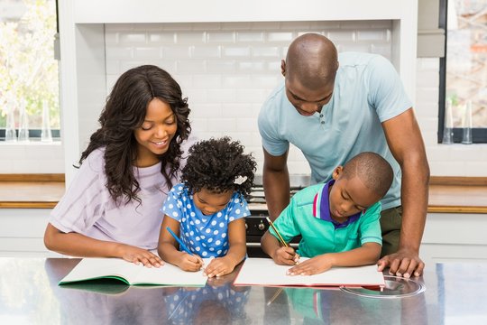 Parents helping children doing homework - Powered by Adobe