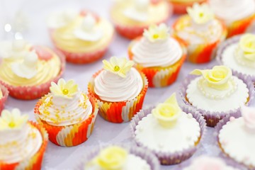 Decorated cupcakes on a white table
