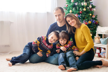 Happy family having fun at home, Christmas family portrait